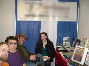 Folks hanging out at the book booth